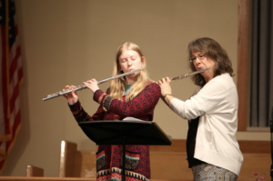 Erika Leake McKnight and Student Playing